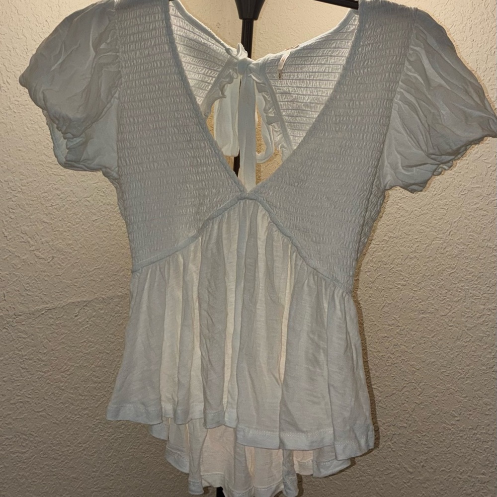 Free People White Smocked Blouse open back Small brass tag Cotton flutter sleeve
